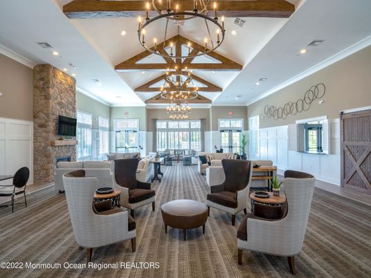 Chandelier, Fireplace, Interior, Living room, Recessed Lighting, Stone Walls, Wooden Beams