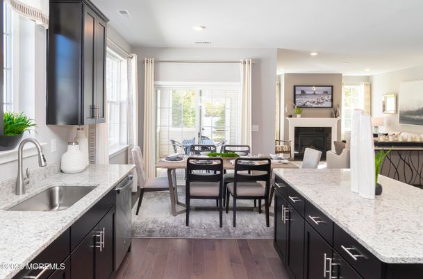 Dining room, Fireplace, Interior, Kitchen, Recessed Lighting, Wood Texture Flooring