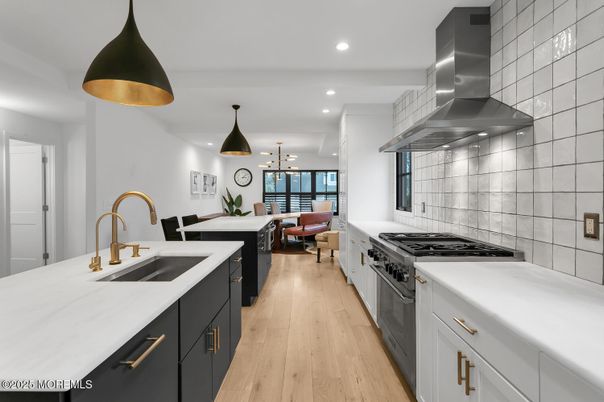 Dining room, Interior, Kitchen, Living room, Pendant Lights, Recessed Lighting, Stainless Steel Appliances, Wood Texture Flooring