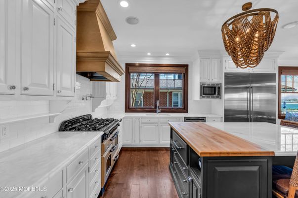 Chandelier, Interior, Kitchen, Recessed Lighting, Stainless Steel Appliances, Wood Texture Flooring