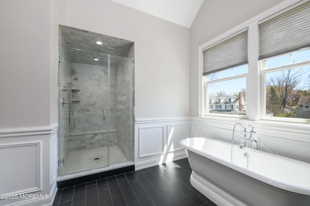 Bathroom, Free Standing Baths, Glass Shower, Interior, Marble Walls, Recessed Lighting, Wood Texture Flooring