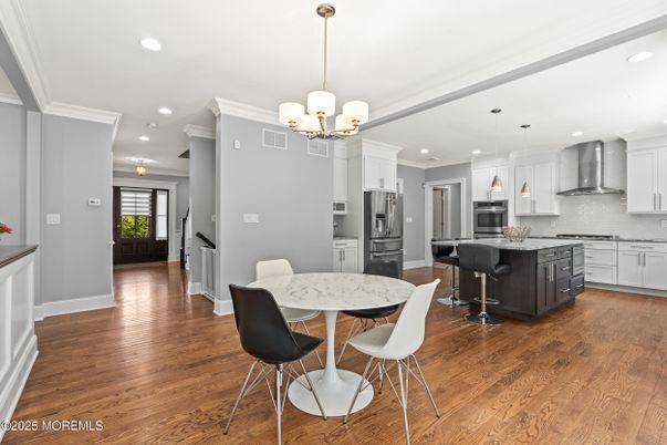 Chandelier, Dining room, Interior, Kitchen, Pendant Lights, Recessed Lighting, Stainless Steel Appliances, Wood Texture Flooring