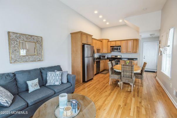 Dining room, Interior, Kitchen, Living room, Recessed Lighting, Stainless Steel Appliances, Wood Texture Flooring