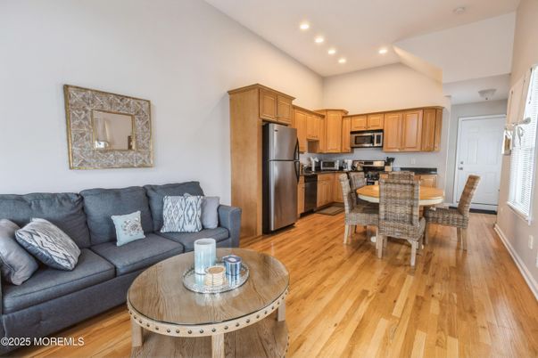 Dining room, Interior, Kitchen, Living room, Recessed Lighting, Stainless Steel Appliances, Wood Texture Flooring