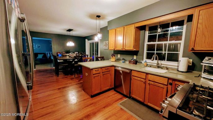 Dining room, Interior, Kitchen, Pendant Lights, Stainless Steel Appliances, Wood Texture Flooring