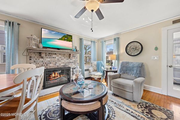 Dining room, Fireplace, Interior, Living room, Wood Texture Flooring