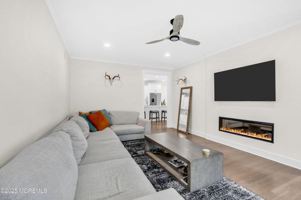 Fireplace, Interior, Living room, Recessed Lighting, Wood Texture Flooring