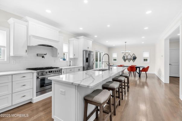 Dining room, Interior, Kitchen, Pendant Lights, Recessed Lighting, Stainless Steel Appliances, Wood Texture Flooring