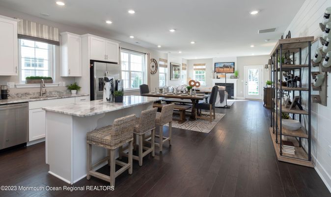 Dining room, Interior, Kitchen, Recessed Lighting, Stainless Steel Appliances, Wood Texture Flooring