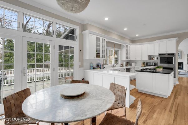 Dining room, Interior, Kitchen, Recessed Lighting, Stainless Steel Appliances, Wood Texture Flooring