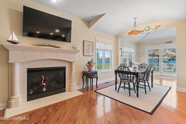 Dining room, Fireplace, Interior, Pendant Lights, Recessed Lighting, Wood Texture Flooring