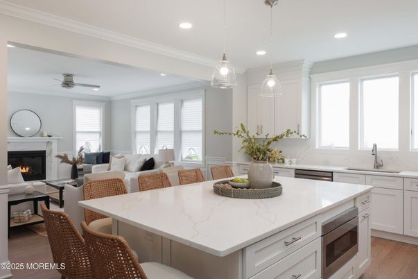 Dining room, Fireplace, Interior, Kitchen, Living room, Pendant Lights, Recessed Lighting, Wood Texture Flooring