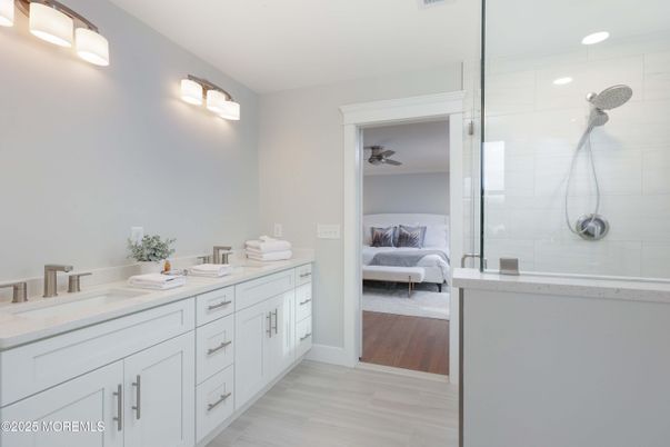 Bathroom, Bedroom, Dual Sink Vanities, Glass Shower, Interior, Recessed Lighting, Wood Texture Flooring