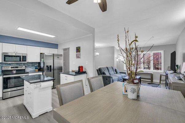 Dining room, Interior, Kitchen, Living room, Stainless Steel Appliances, Wood Texture Flooring