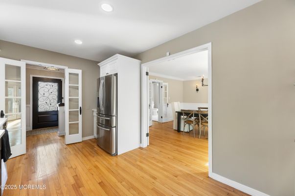 Dining room, Interior, Kitchen, Recessed Lighting, Stainless Steel Appliances, Wood Texture Flooring