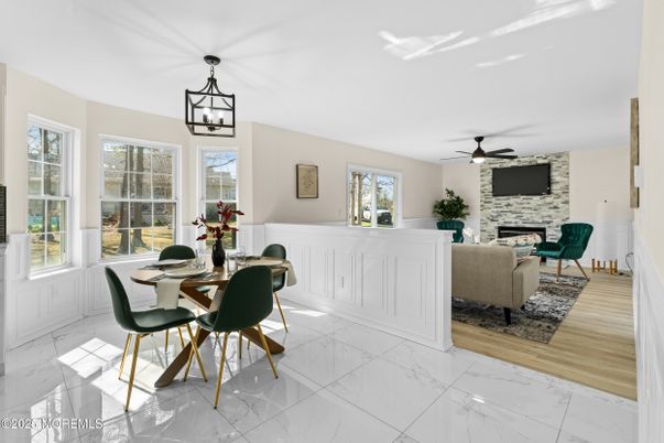 Dining room, Fireplace, Interior, Living room, Marble, Pendant Lights, Stone Walls