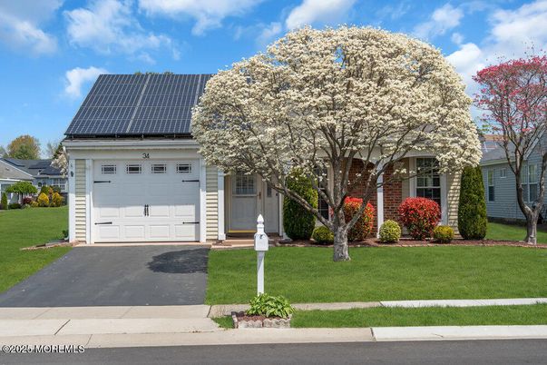 Attached, Exterior, Facade, Solar Panels, French Provincial