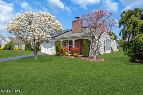 Attached, Backyard, Exterior, Facade, Brick Facade, Solar Panels, Cape Cod