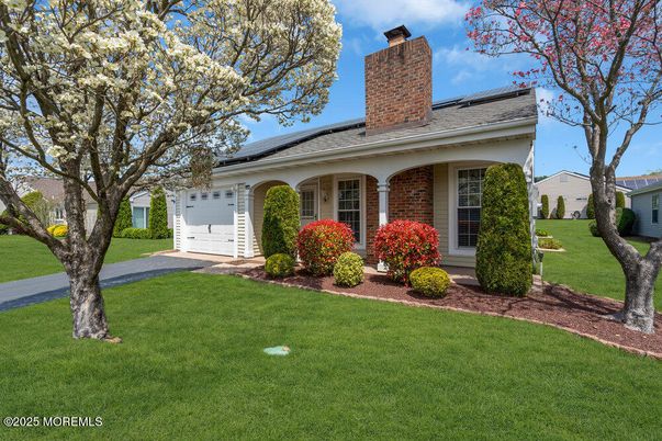 Attached, Exterior, Facade, Brick Facade, Solar Panels, Ranch