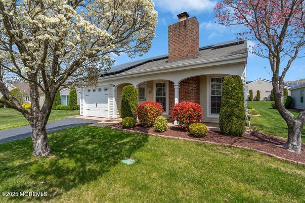 Attached, Exterior, Facade, Brick Facade, Solar Panels, Ranch