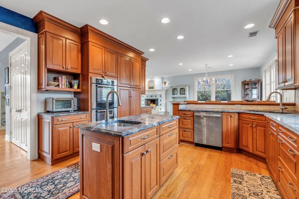 Chandelier, Interior, Kitchen, Recessed Lighting, Stainless Steel Appliances, Wood Texture Flooring