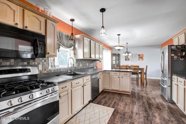 Dining room, Interior, Kitchen, Pendant Lights, Stainless Steel Appliances, Wood Texture Flooring