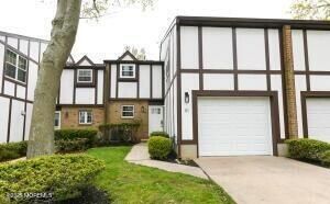 Attached, Backyard, Exterior, Facade, Brick Facade, Tudor Revival