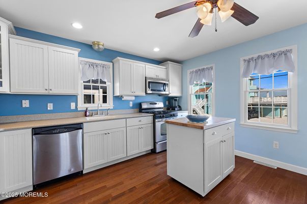 Interior, Kitchen, Recessed Lighting, Stainless Steel Appliances, Wood Texture Flooring