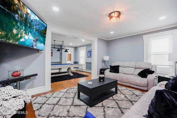 Billiard Table, Game Room, Interior, Living room, Pendant Lights, Recessed Lighting, Wood Texture Flooring