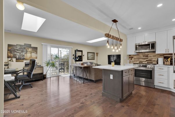 Dining room, Interior, Kitchen, Pendant Lights, Recessed Lighting, Stainless Steel Appliances, Wood Texture Flooring