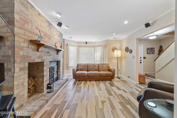 Fireplace, Interior, Recessed Lighting, Stone Walls, Wood Texture Flooring