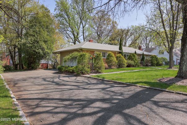 Attached, Backyard, Exterior, Facade, Brick Facade, Ranch