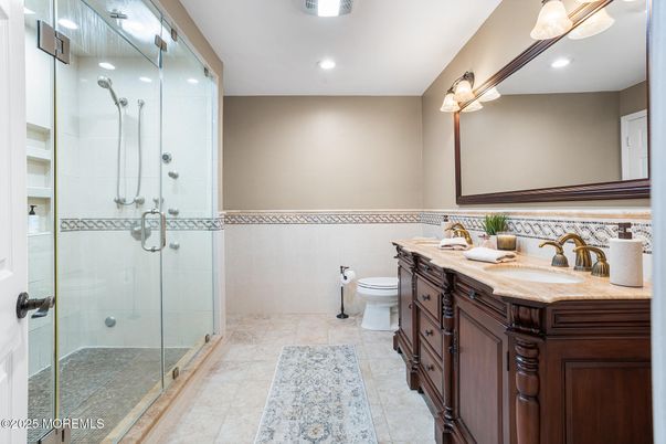 Bathroom, Dual Sink Vanities, Glass Shower, Interior, Recessed Lighting, Tile Countertops