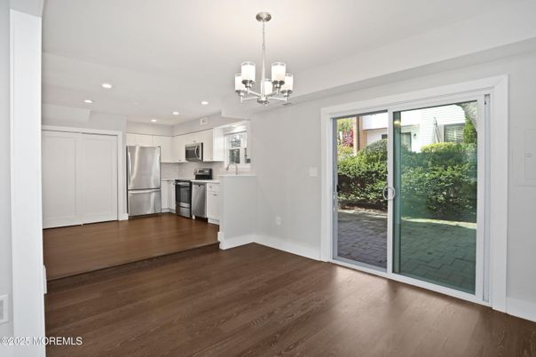 Chandelier, Interior, Kitchen, Pendant Lights, Recessed Lighting, Stainless Steel Appliances, Wood Texture Flooring