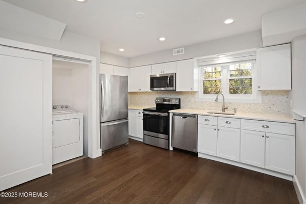 Interior, Kitchen, Recessed Lighting, Stainless Steel Appliances, Washer, Wood Texture Flooring