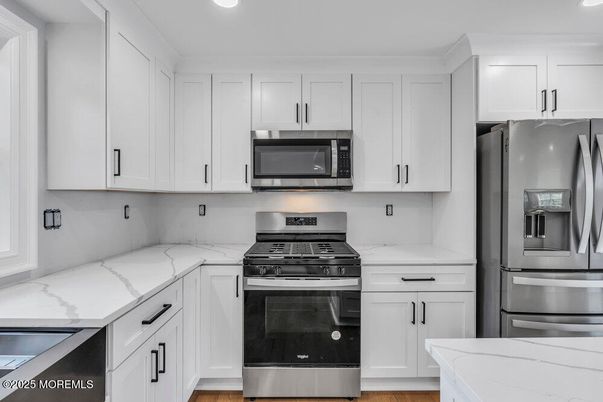 Interior, Kitchen, Recessed Lighting, Stainless Steel Appliances, Wood Texture Flooring