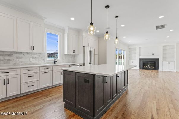Fireplace, Interior, Kitchen, Pendant Lights, Recessed Lighting, Wood Texture Flooring