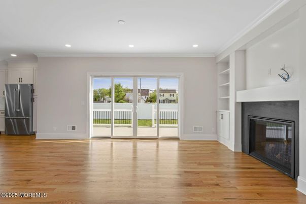 Empty room, Fireplace, Interior, Recessed Lighting, Wood Texture Flooring