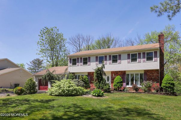 Exterior, Facade, Brick Facade, Raised Ranch