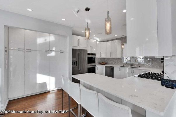 Interior, Kitchen, Pendant Lights, Recessed Lighting, Stainless Steel Appliances, Wood Texture Flooring