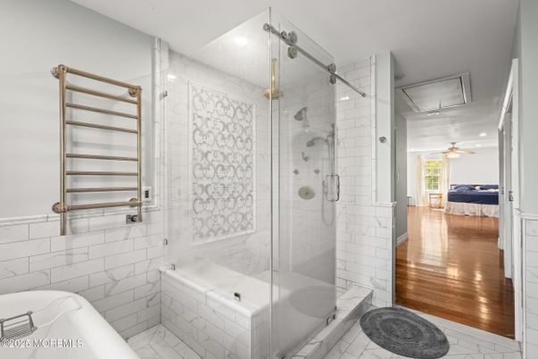 Bathroom, Glass Shower, Interior, Marble Walls, Recessed Lighting, Wood Texture Flooring