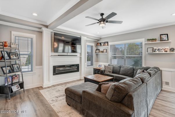 Fireplace, Interior, Living room, Recessed Lighting, Wood Texture Flooring