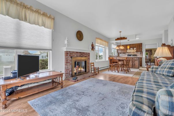 Dining room, Fireplace, Interior, Kitchen, Living room, Pendant Lights, Wood Texture Flooring