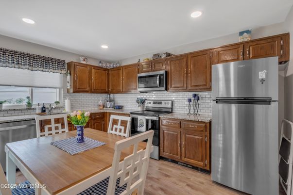 Interior, Kitchen, Recessed Lighting, Stainless Steel Appliances, Wood Texture Flooring