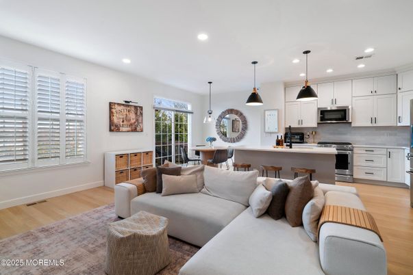 Dining room, Interior, Kitchen, Living room, Pendant Lights, Recessed Lighting, Stainless Steel Appliances, Wood Texture Flooring