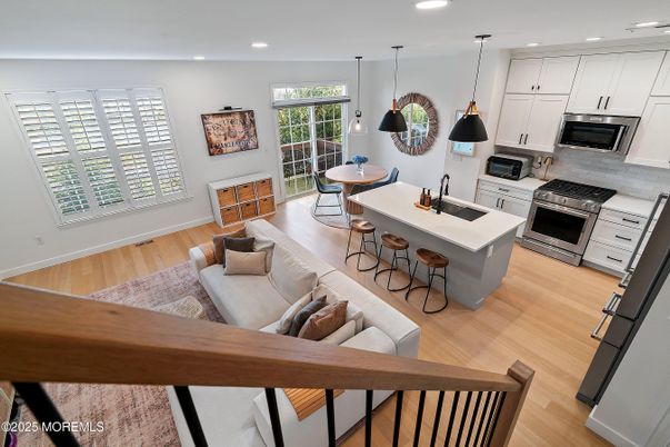 Dining room, Interior, Kitchen, Living room, Pendant Lights, Recessed Lighting, Stainless Steel Appliances, Wood Texture Flooring