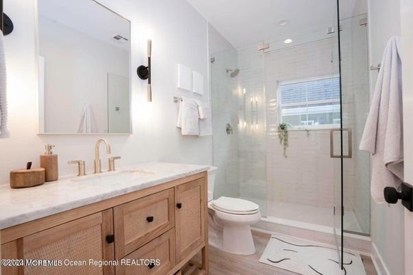 Bathroom, Glass Shower, Interior, Recessed Lighting, Wood Texture Flooring