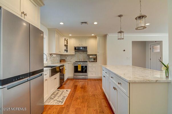 Interior, Kitchen, Pendant Lights, Recessed Lighting, Stainless Steel Appliances, Wood Texture Flooring
