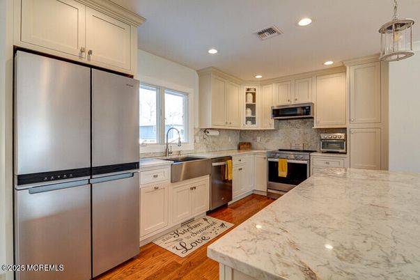 Interior, Kitchen, Pendant Lights, Recessed Lighting, Stainless Steel Appliances, Wood Texture Flooring