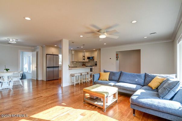Dining room, Interior, Kitchen, Living room, Recessed Lighting, Stainless Steel Appliances, Wood Texture Flooring